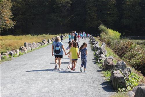 Children walking on cinder path