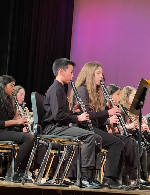 Boy playing clarinet