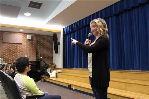 Woman speaking into mircophone