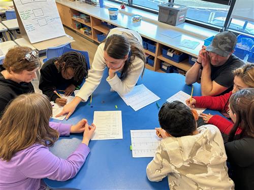 Woman works with children