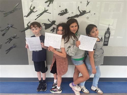 Sturdents holding scripts